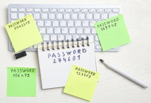 image shows easy to crack passwords on post it notes